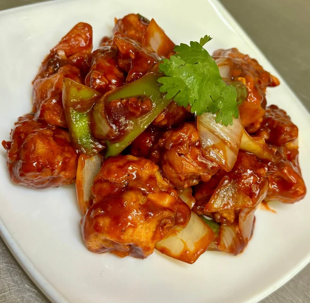 Authentic Indian curry dish prepared fresh at Rang Mahal restaurant in London, Ontario